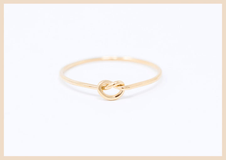 Love knot ring in gold or silver thin stack ring in Lexington, Kentucky