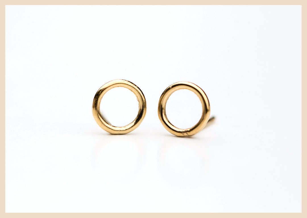 Circle gold earring stud jewelry in Lexington, Kentucky