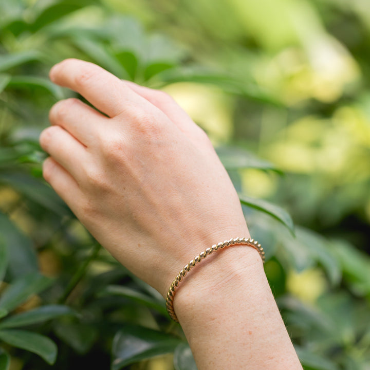 Gold bangle cuff twisted wire handmade in Lexington, Kentucky by Anna Shae Jewelry