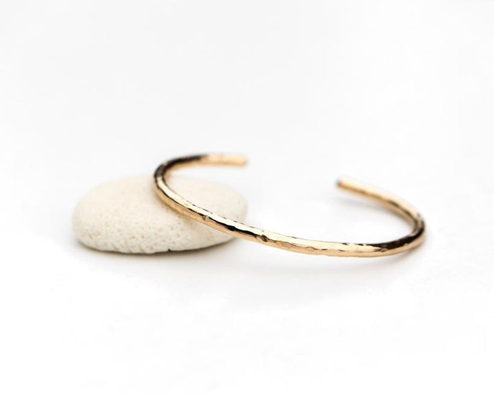 Hammered gold thin bangle cuff bracelet by Anna Shae Jewelry in Lexington, Kentucky