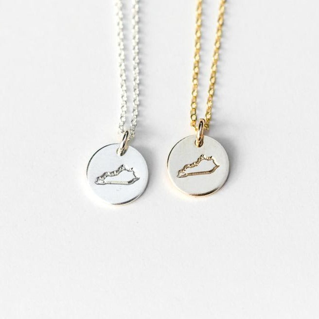 Silver or Gold Kentucky pendant disk necklaces on a gold or silver chain makes for a great local gift by Anna Shae Jewelry in Lexington, Kentucky