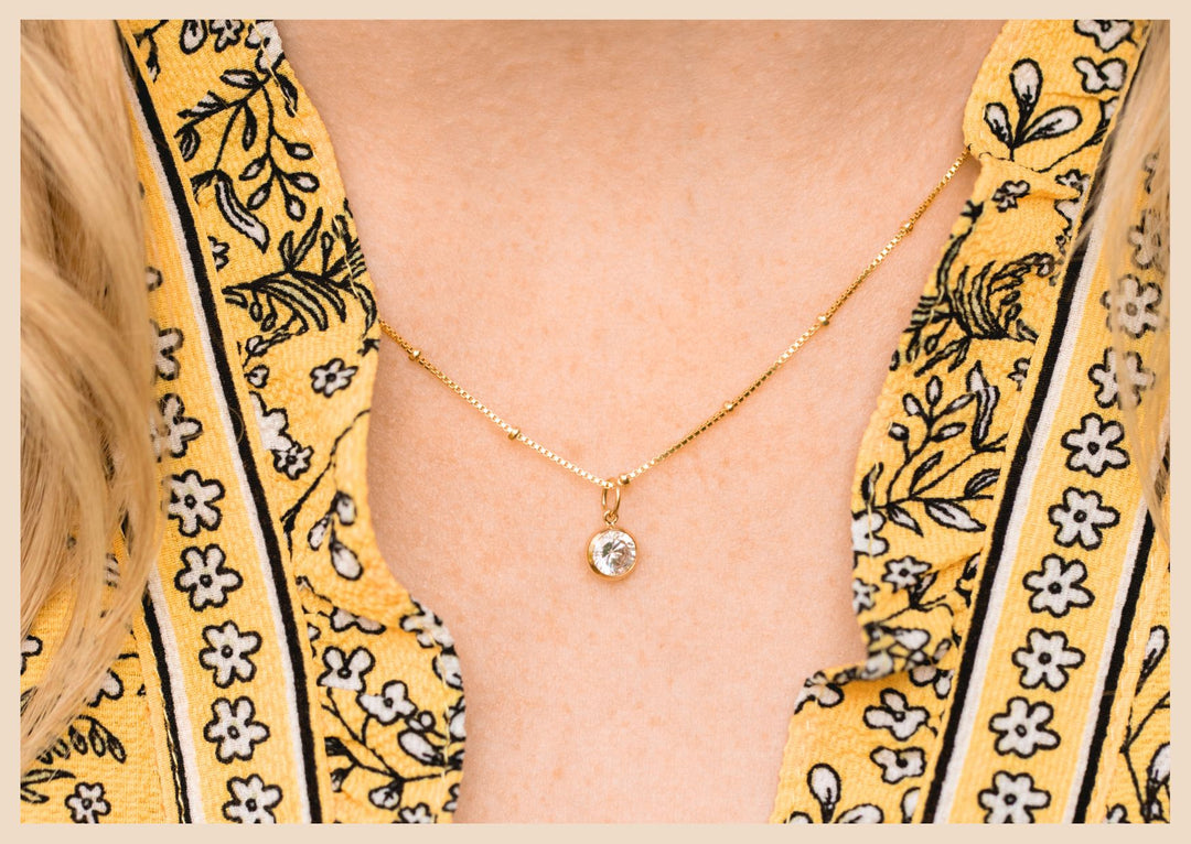 Small gold charm necklace with a diamond in Lexington, Kentucky by Anna Shae Jewelry