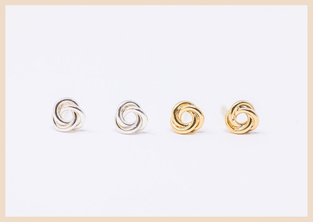 Love knot gold and silver stud earrings in Lexington, Kentucky 