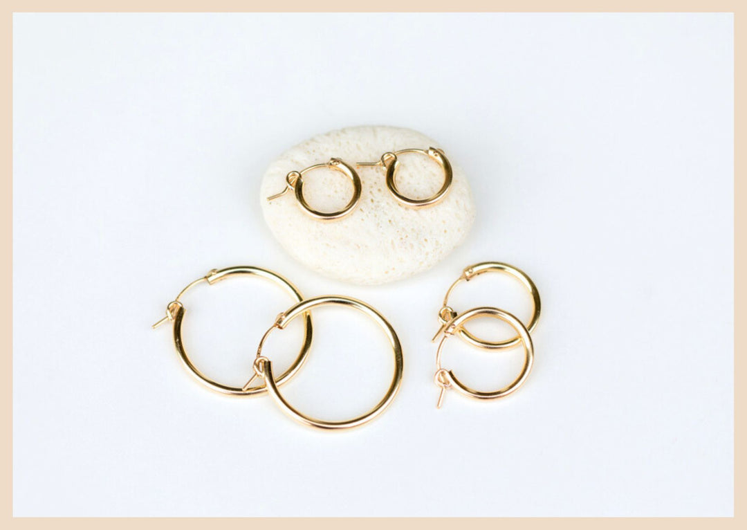 Gold hoop earrings in small, medium, and large in Lexington, Kentucky