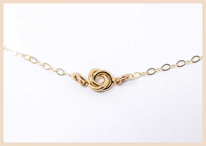 Gold Love knot necklace