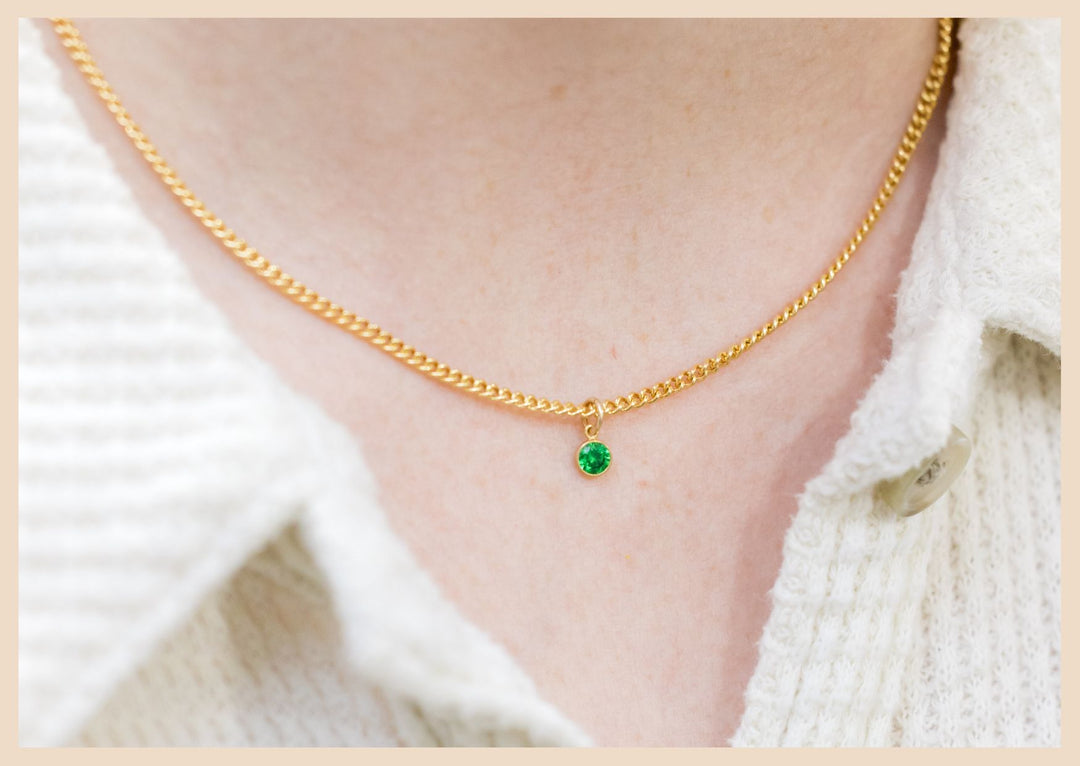 The Gold Curb Chain Birthstone Necklace for May - Emerald. Based in Lexington, Kentucky