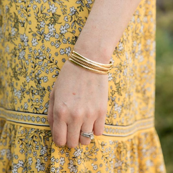 Thin gold bangle cuff bracelet stack by Anna Shae Jewelry in Lexington, Kentucky