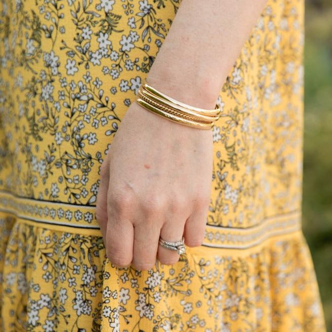 Gold twisted bracelet bangle stack by Anna Shae Jewelry in Lexington, Kentucky 