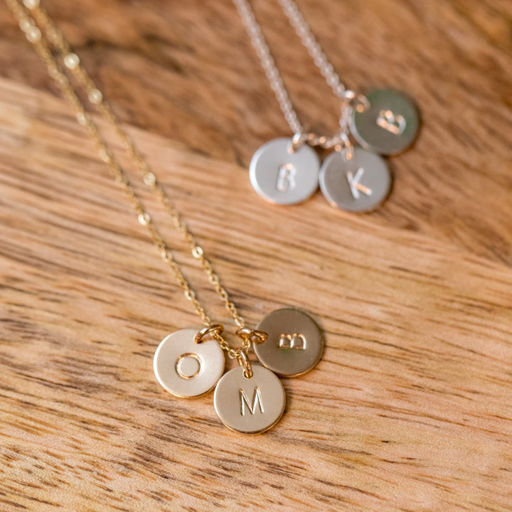Personalized gift gold necklace with loved ones multiple initials by Anna Shae Jewelry in Lexington, Kentucky. 