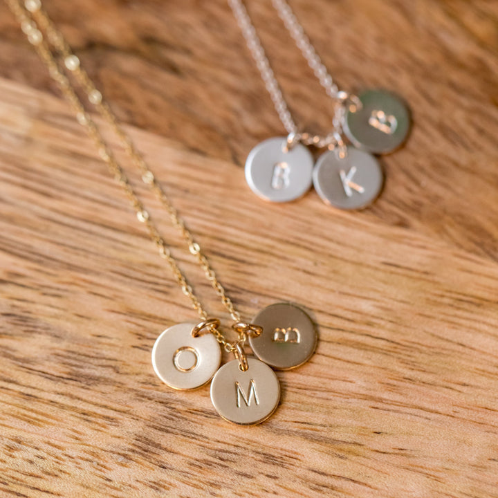 Gold or Silver personalized initial disks on a gold or silver chain by Anna Shae Jewelry in Lexington, Kentucky 