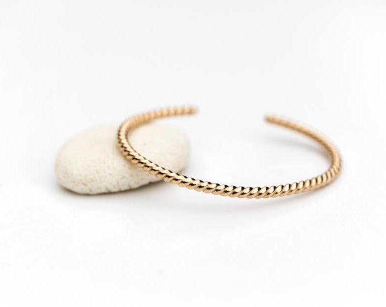 Twisted gold bangle cuff bracelet by Anna Shae Jewelry in Lexington, Kentucky 