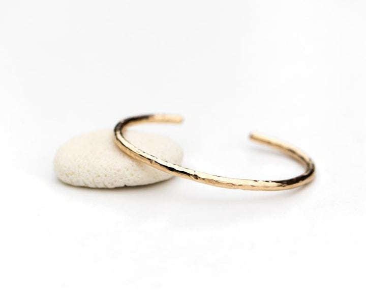 Hammered gold thin bangle cuff bracelet by Anna Shae Jewelry in Lexington, Kentucky 
