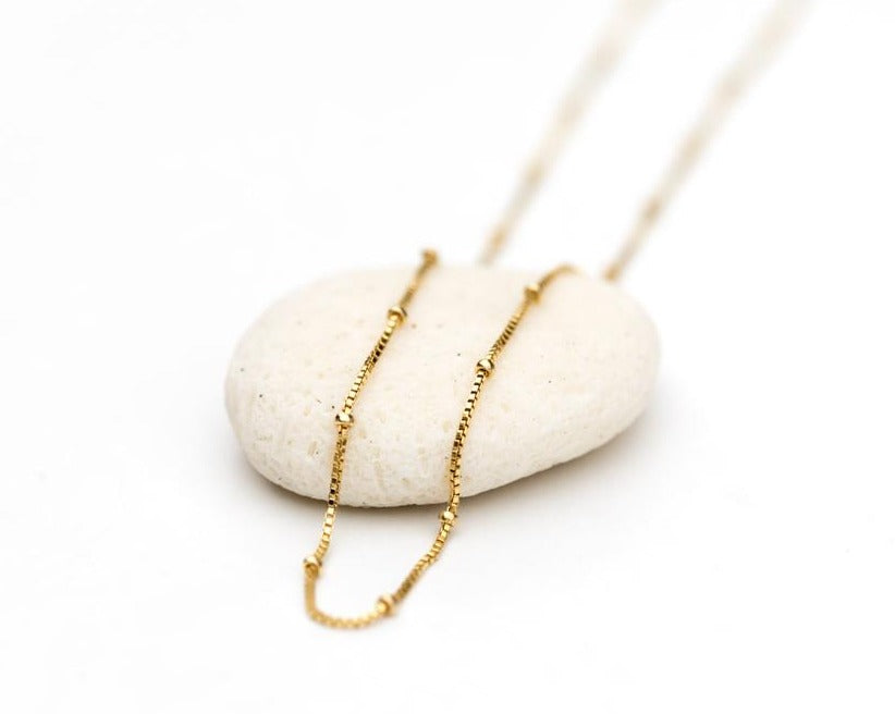 minimalistic gold bead chain made out of gold filled metal by Anna Shae Jewelry in Lexington, Kentucky 