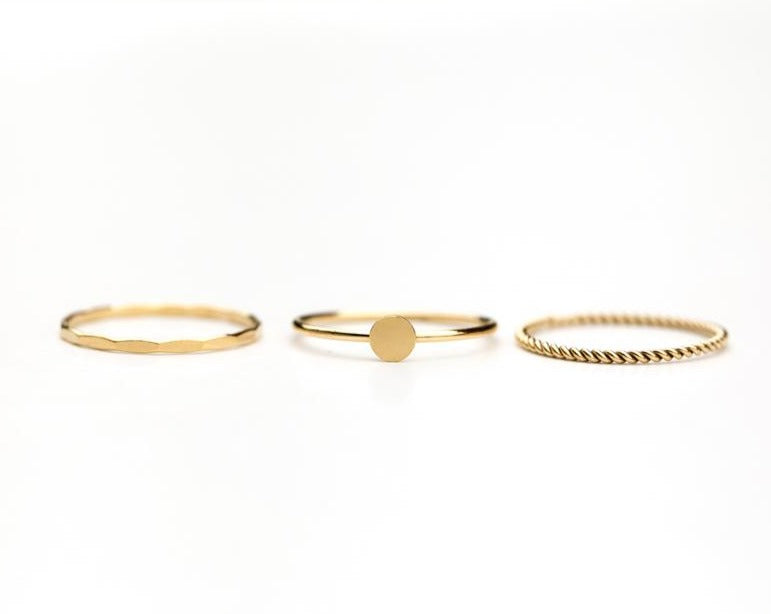 Three gold stack ring set by Anna Shae Jewelry in Lexington, Kentucky