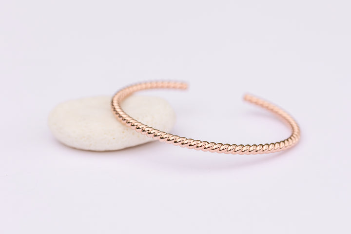 Rose Gold Woven Twisted Bangle Cuff Bracelet handmade by Anna Shae Jewelry in Lexington, Kentucky